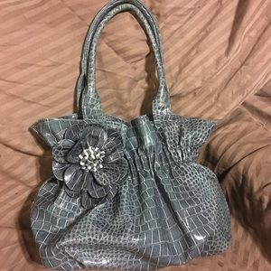 Stunning greenish blue crocodile purse with flower